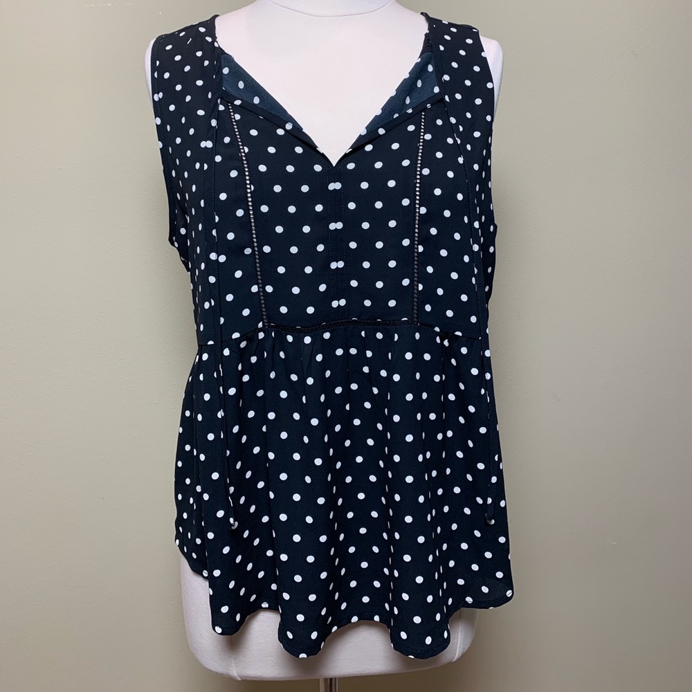 Q&A	Venice Relaxed Peplum Blouse